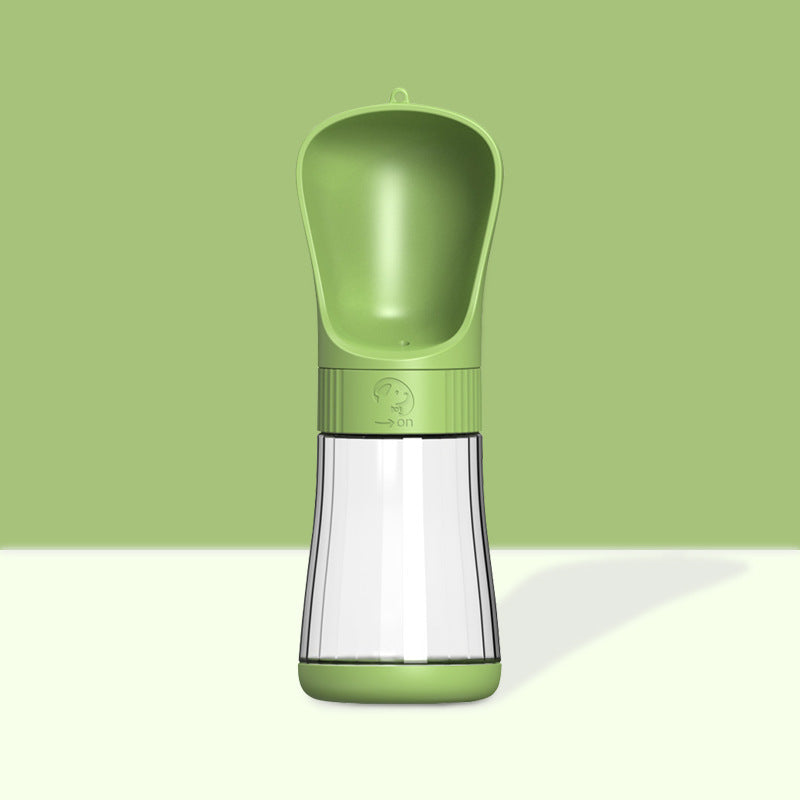 The Dog Travels With A Water Cup To Drink From An Outdoor Water