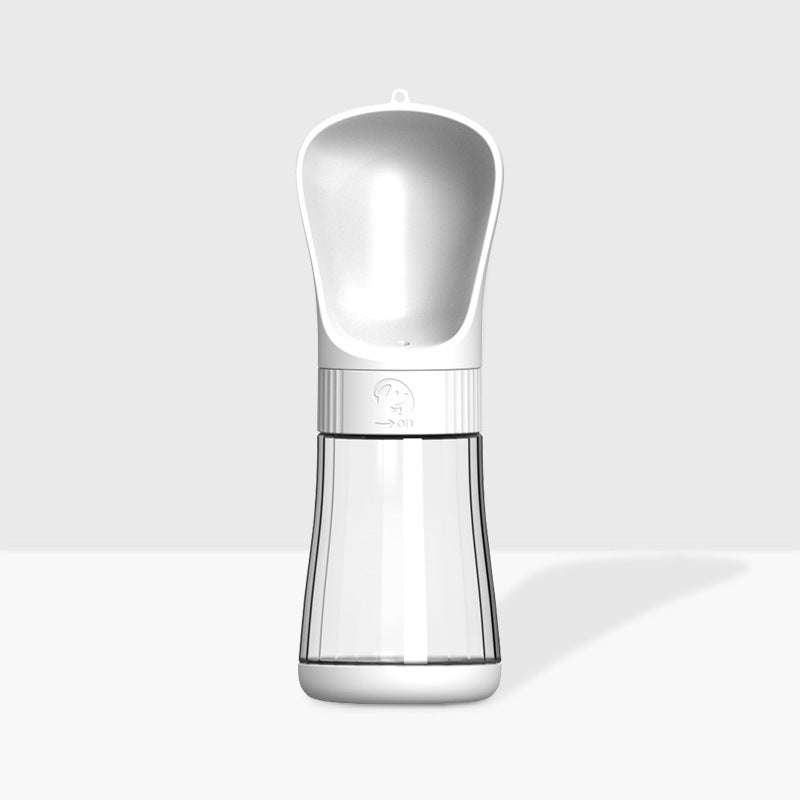 The Dog Travels With A Water Cup To Drink From An Outdoor Water